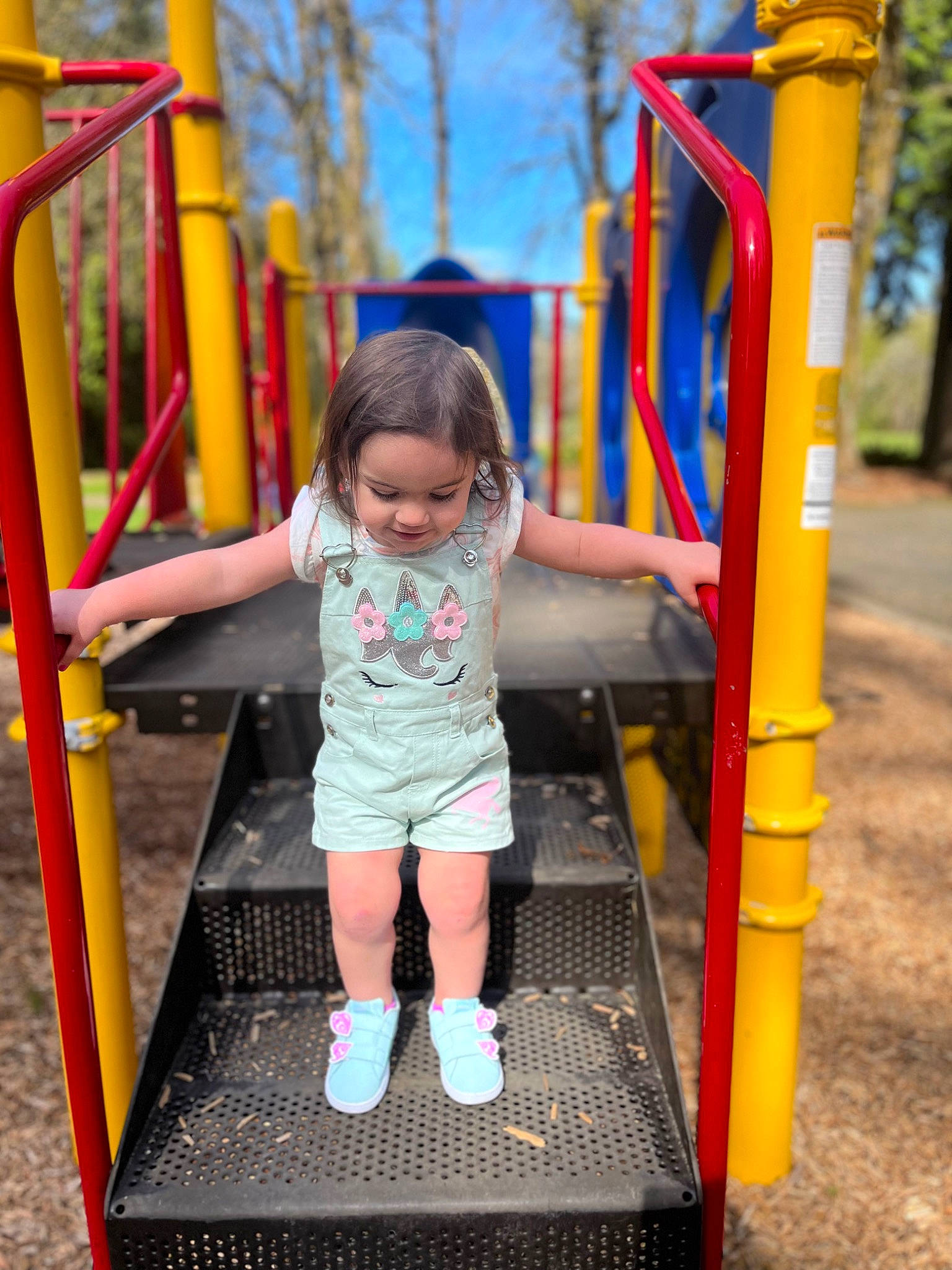 Kendal is registered to the contest to win money with this photo: baby_toddler_clothing, child, chute, city, fun, grass, happy, joy, leisure, outdoor_play_equipment, person, play, playground, playground_slide, recreation, shorts, t_shirt, toddler, yellow