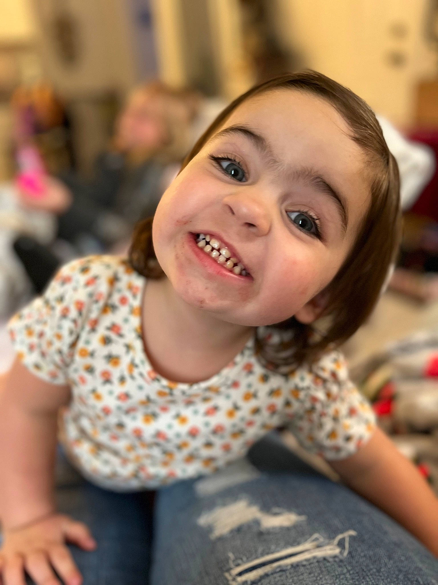 Kendal is registered to the contest to win money with this photo: blond, brown_hair, cheek, child, event, flash_photography, flooring, fun, hairstyle, happy, iris, joy, leisure, lip, mammal, pattern, person, sitting, skin, smile