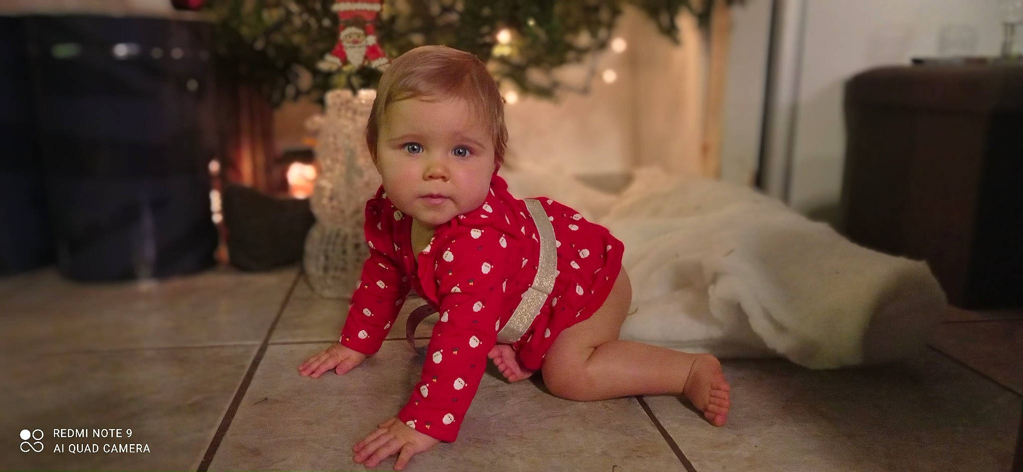 Yvanna participe au concours pour gagner de l'argent avec cette photo : baby, baby_toddler_clothing, cheek, child, dress, eye, face, facial_expression, flash_photography, floor, flooring, fun, happy, head, iris, person, sleeve, smile, standing, toddler