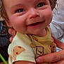 Zylus is registered to the contest to win money with this photo: baby, smiling, child, face, eyes, hand, clothing, cute, infant, person, happy, skin, cheeks, mouth, holding, finger, short_sleeve, indoor, closeup, expression