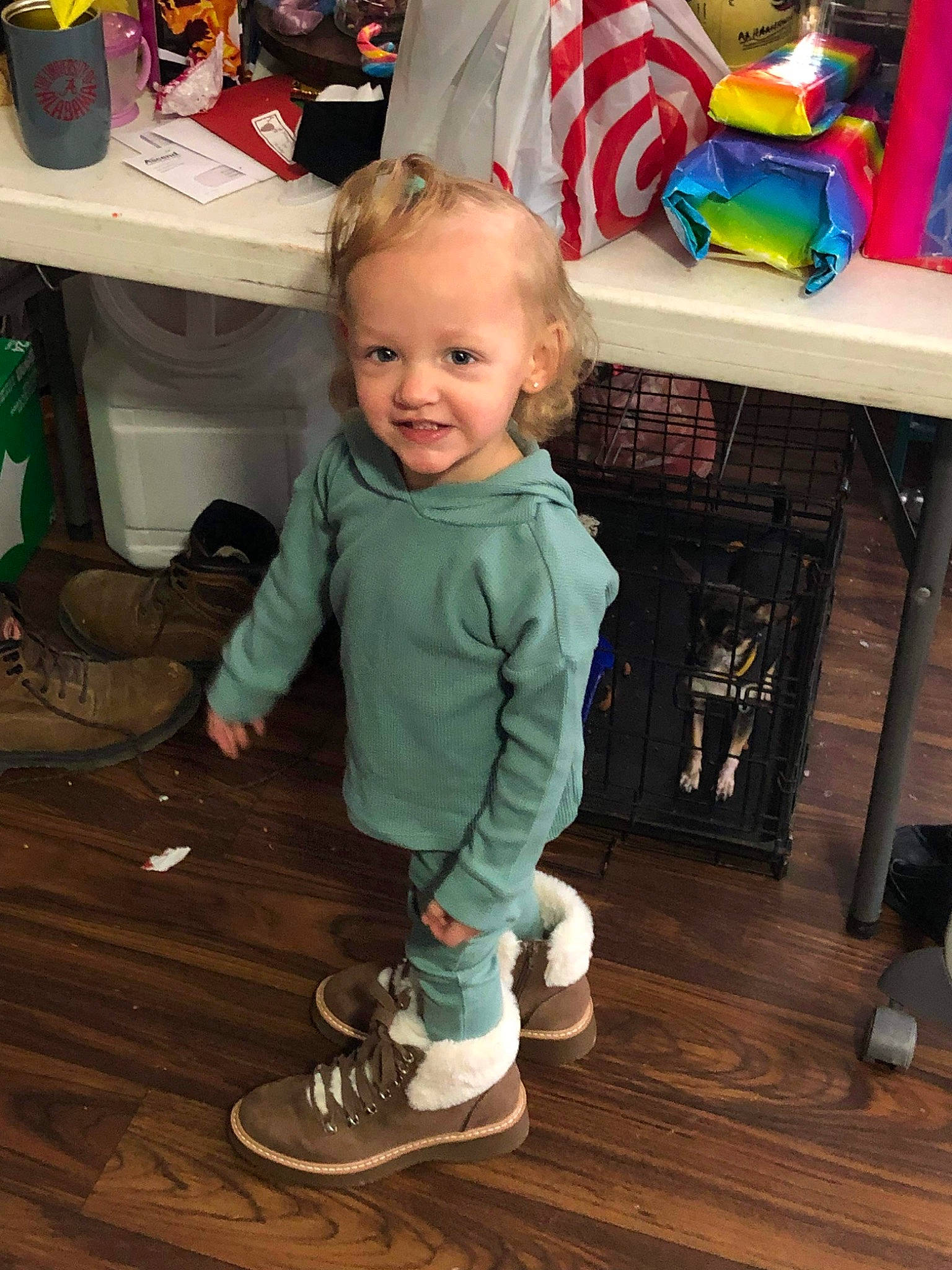 Maggie is registered to the contest to win money with this photo: baby, baby_toddler_clothing, cabinetry, child, drawer, floor, flooring, fun, green, hardwood, head, person, product, room, shelf, shoe, sleeve, smile, standing, toddler