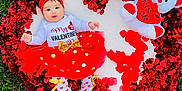 Mia is registered to the contest to win money with this photo: adorable, baby, blanket, celebration, child, cute, festive, grass, headband, heart_shape, holiday, infant, outdoor, petals, portrait, red_garland, red_tutu, smiling, teddy_bear, valentine