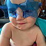 Kai joined the competition — help win amazing prizes! toddler, child, face, glasses, sunglasses, blue, star_shaped, skin, smile, indoor, blanket, cute, young_child, person, portrait, baby, eyewear, head, expression, casual