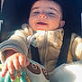 Kenan participe au concours pour gagner de l'argent avec cette photo : baby, baby_toy, car_seat, child, close_up, cozy, cute, fleece_jacket, hand, happy, indoor, infant, pacifier, plush_toy, portrait, seatbelt, smiling, soft_texture, sunlight, warm_clothing