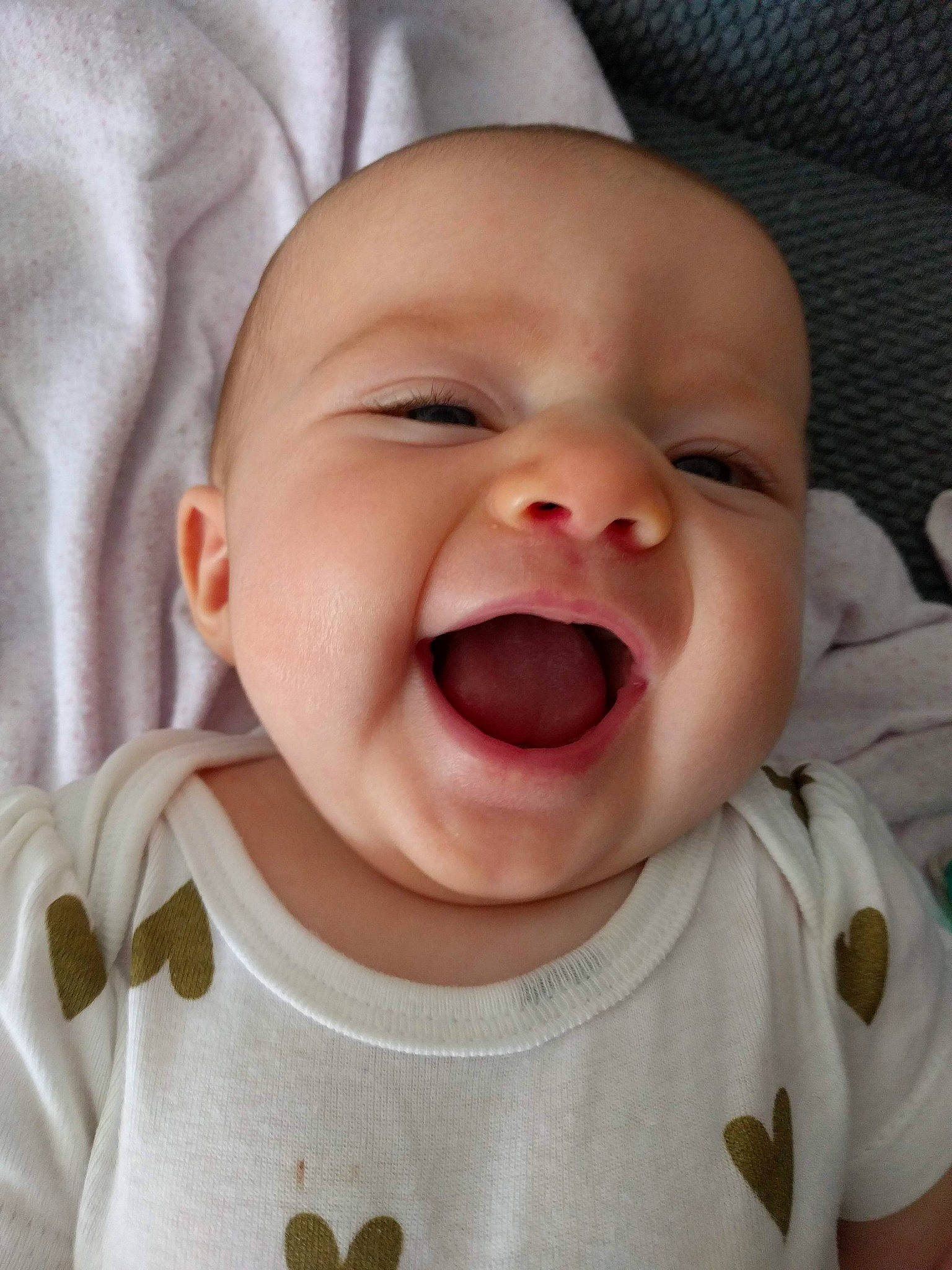 Selah joined the competition — help win amazing prizes! cheek, child, chin, close_up, ear, emotion, face, facial_expression, forehead, head, infant, laughter, lip, mouth, nose, person, skin, smile, tongue, tooth