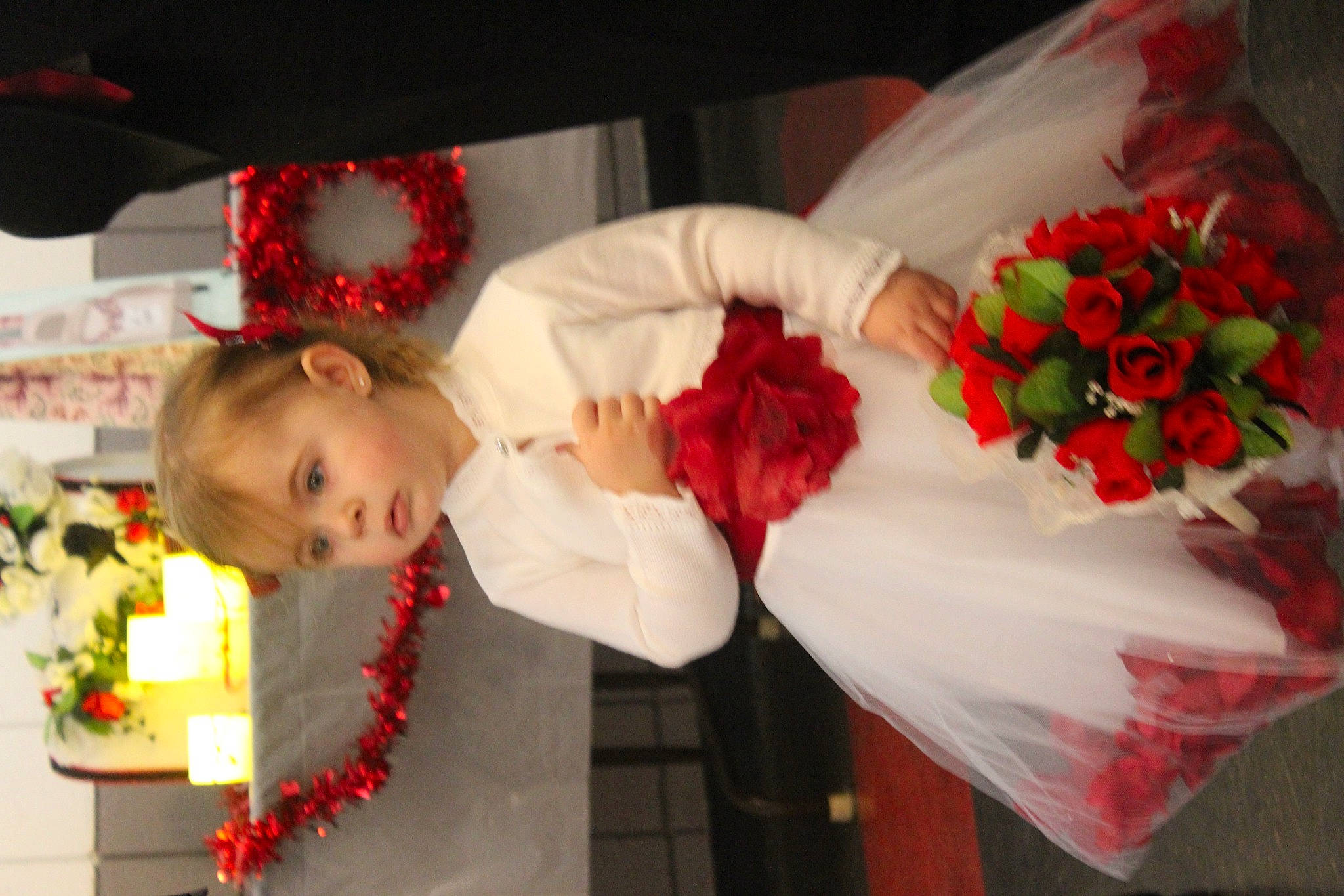 Bella joined the competition — help win amazing prizes! baby, bouquet, bridal_clothing, cut_flowers, dress, event, flower, flower_arranging, formal_wear, happy, orange, person, petal, plant, red, rose, toddler, tradition, wedding_ceremony_supply, wedding_dress