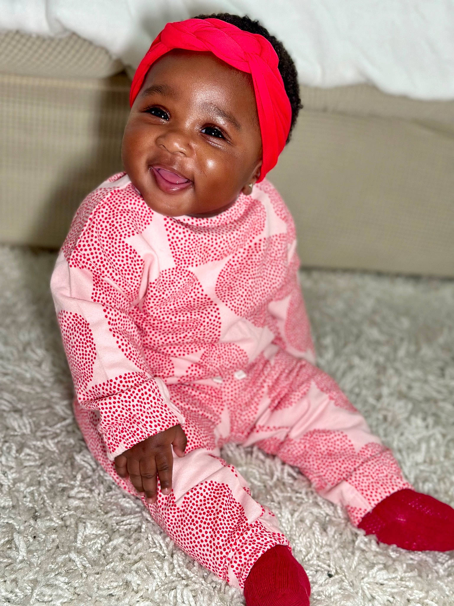 Alisha joined the competition — help win amazing prizes! baby, baby_toddler_clothing, cap, carmine, cheek, child, dress, face, fashion_accessory, happy, lip, magenta, nose, pattern, person, pink, red, skin, sleeve, toddler