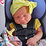 Violet joined the competition — help win amazing prizes! baby, blanket, car_seat, child, clothing, colorful, cute, hands, headband, indoors, infant, monkey_pattern, pacifier, peaceful, portrait, safety_harness, sleeping, smile, soft, yellow_bow