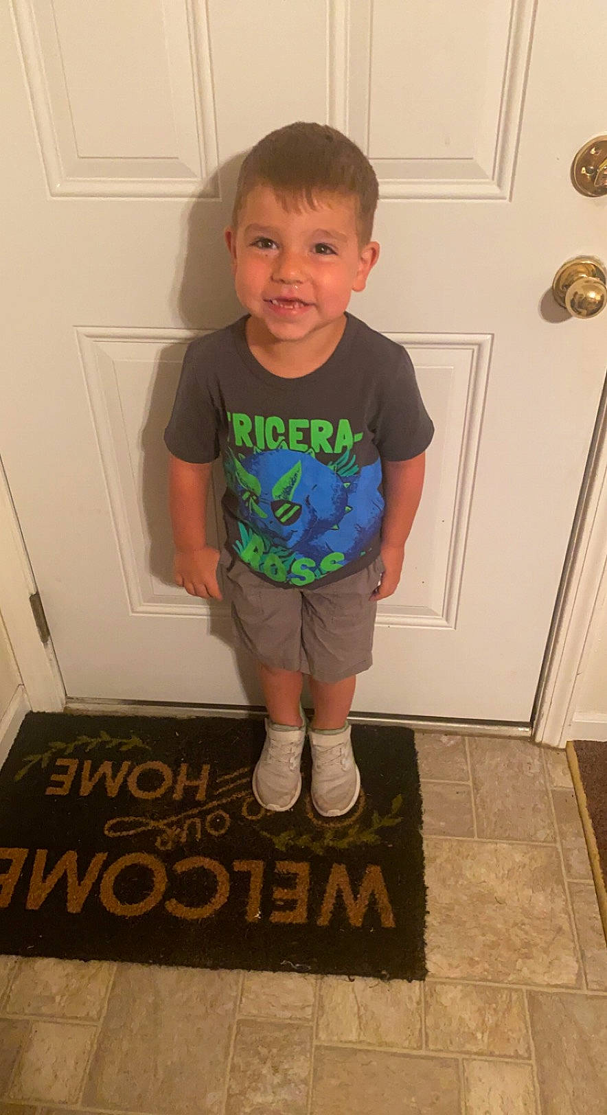Blake joined the competition — help win amazing prizes! baby_toddler_clothing, child, door, eye, floor, flooring, hardwood, head, human_body, joy, knee, leg, pattern, person, shoulder, sleeve, smile, standing, t_shirt, thigh