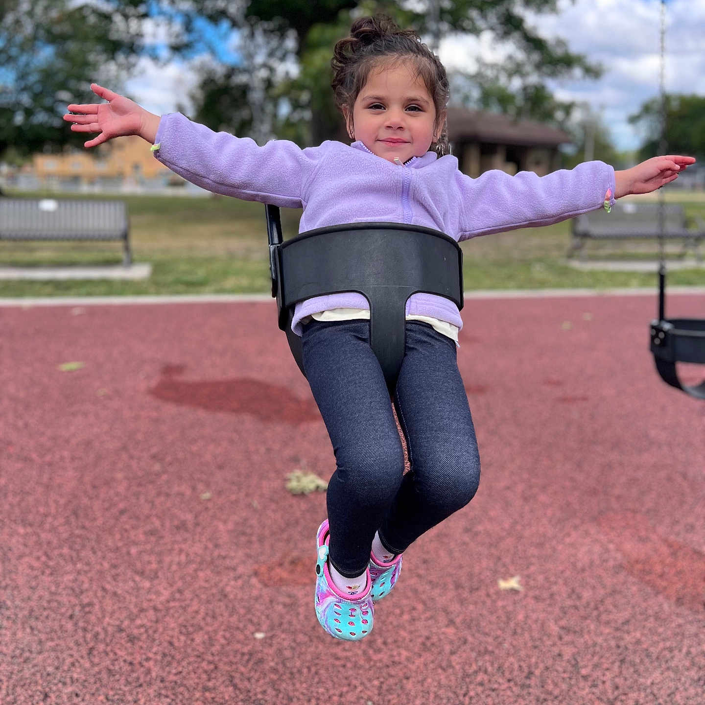Amelia is registered to the contest to win money with this photo: child, clothing, face, female, footwear, girl, grass, head, nature, outdoorplayarea, outdoors, pants, park, person, photography, plant, playarea, portrait, shoe, tree