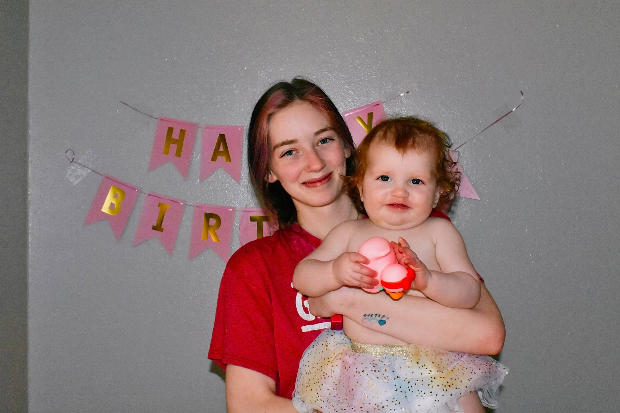 Raelynn joined the competition — help win amazing prizes! abdomen, baby, child, dress, event, eye, face, facial_expression, finger, flash_photography, fun, gesture, happy, joy, magenta, person, pink, post_it_note, skin, smile