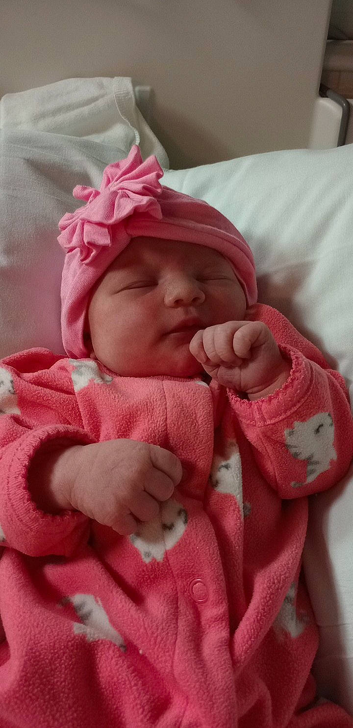 Isabelle joined the competition — help win amazing prizes! baby, baby_products, baby_sleeping, baby_toddler_clothing, cheek, child, chin, comfort, face, facial_expression, finger, headgear, headwear, linens, lip, pattern, person, pink, skin, sleeve