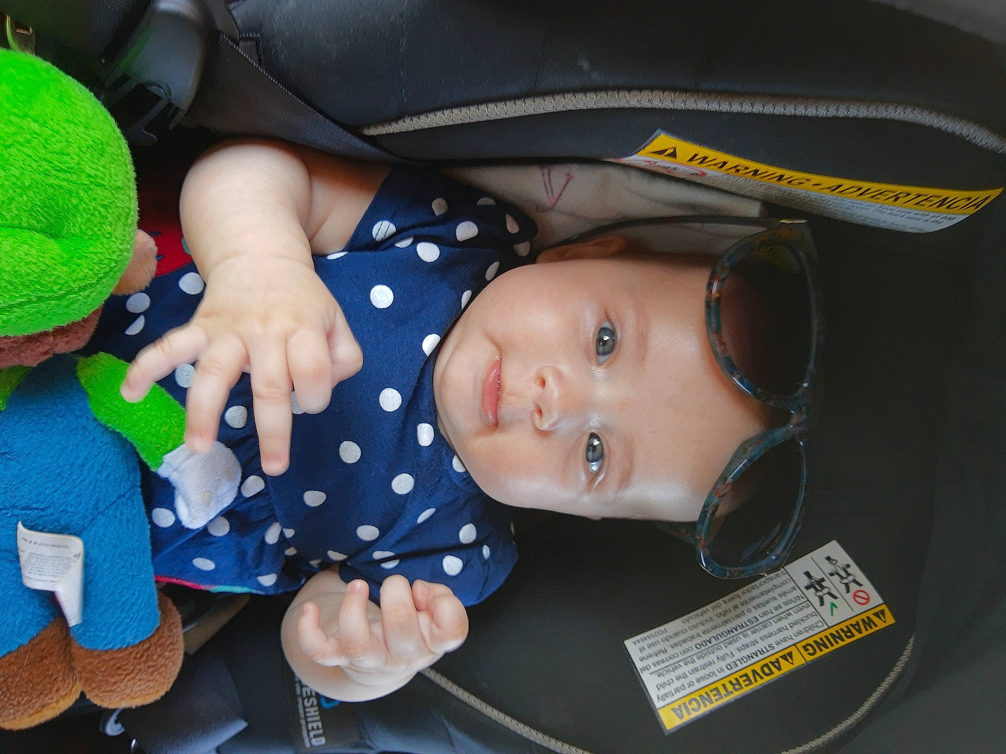 Amber joined the competition — help win amazing prizes! baby, baby_carriage, baby_in_car_seat, baby_products, baby_safety, baby_toddler_clothing, baby_toys, cap, car_seat, cheek, child, comfort, hat, headgear, headwear, nail, pattern, person, product, sitting