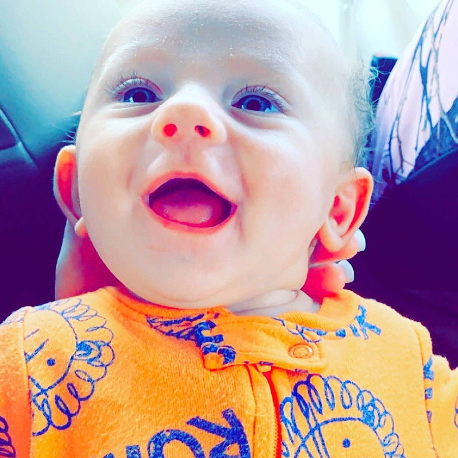 Kuechly joined the competition — help win amazing prizes! baby, cheek, child, ear, face, facial_expression, happy, head, lip, mouth, nose, person, smile, toddler