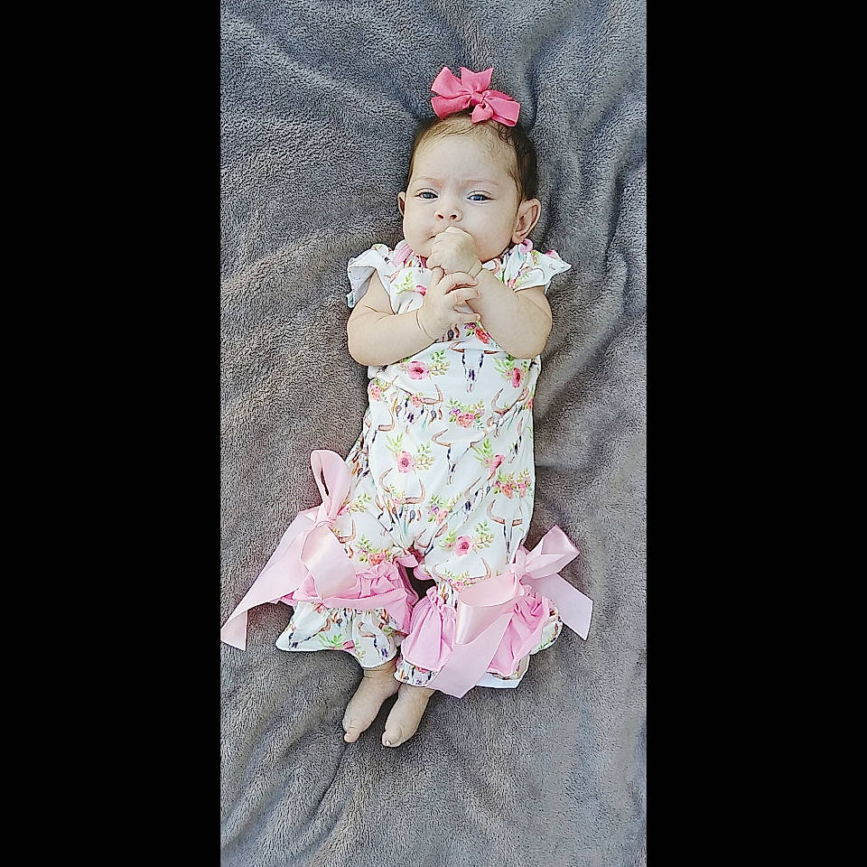 Alaysia joined the competition — help win amazing prizes! baby, baby_toddler_clothing, child, clothing, day_dress, design, dress, hair_accessory, pattern, peach, person, petal, photography, pink, plant, product, sitting, smile, textile, toddler