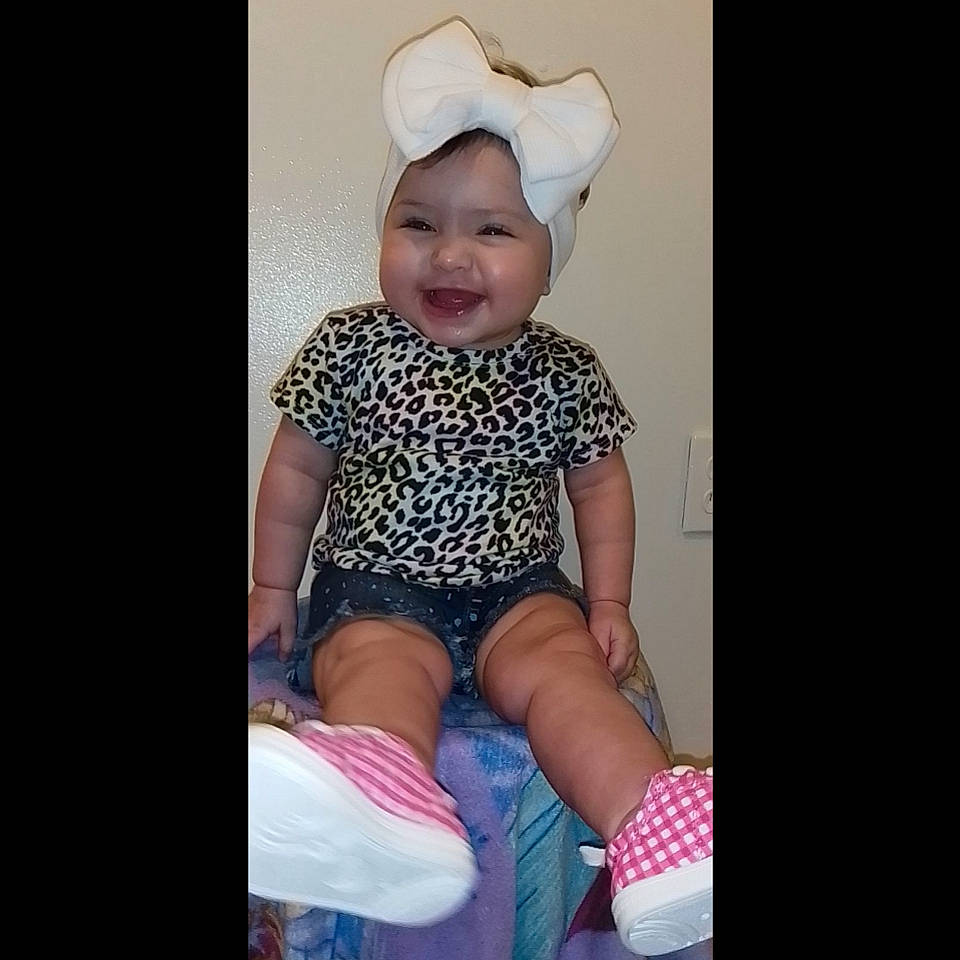 Alaysia joined the competition — help win amazing prizes! baby, baby_toddler_clothing, cool, eye, happy, headwear, human_body, joy, knee, lap, leg, neck, person, pink, purple, shirt, shorts, sleeve, smile, t_shirt