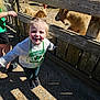 Ember joined the competition — help win amazing prizes! animal, beads, casual_clothing, child, concrete, daylight, fence, girl, goat, happy, nature, outdoor, person, petting_zoo, pigtails, playful, shadow, smiling, sunlight, sweatshirt