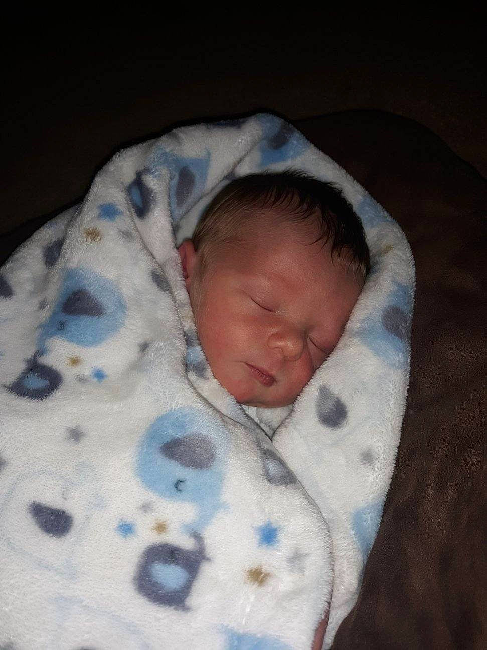Leeland is registered to the contest to win money with this photo: baby, baby_sleeping, bedtime, blanket, cheek, child, linens, nap, person, skin, sleep, textile