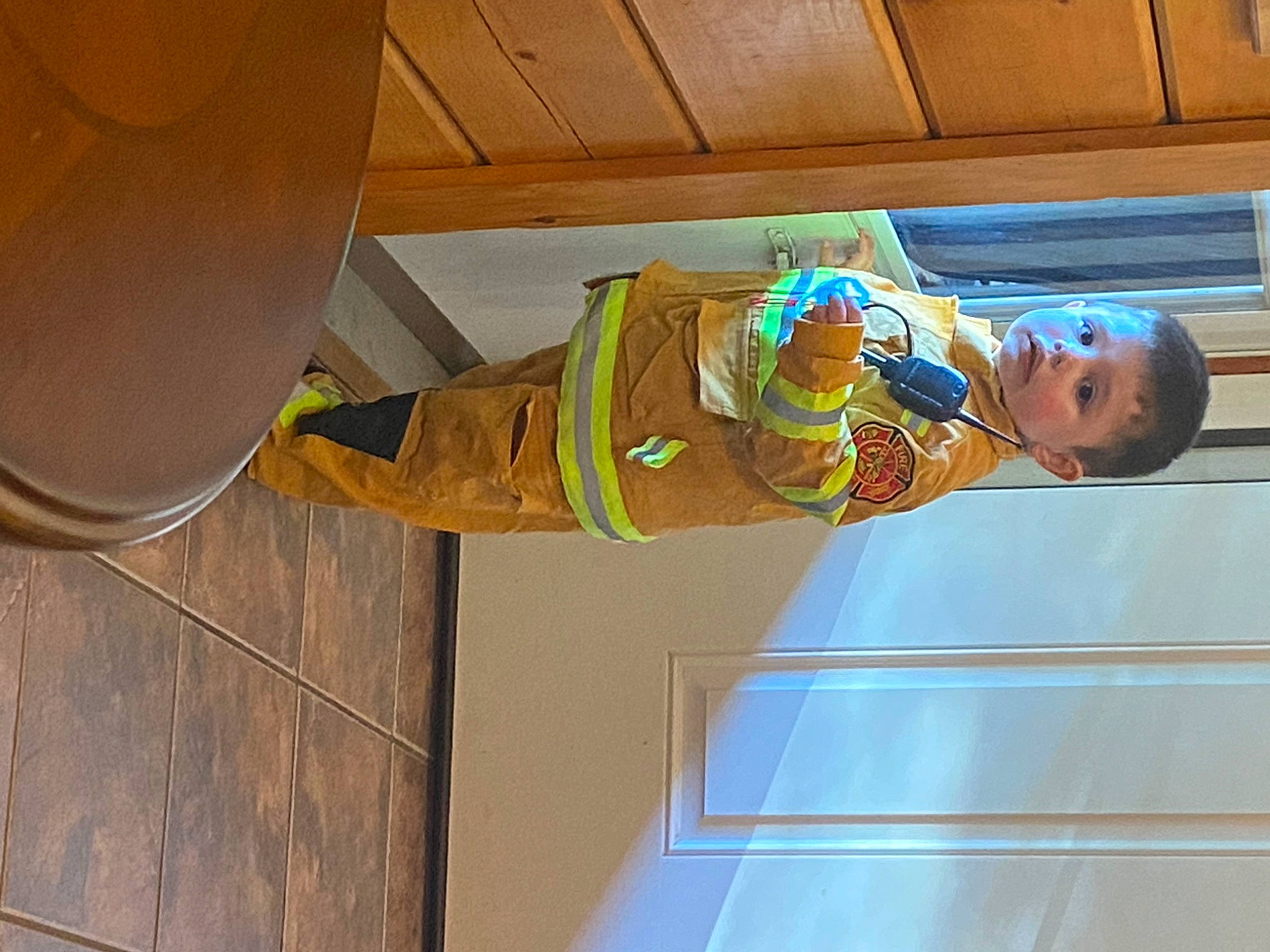 Jayce joined the competition — help win amazing prizes! baby, baby_toddler_clothing, ceiling, flooring, fun, hardwood, hat, leisure, outdoor_shoe, person, personal_protective_equipment, plywood, room, toddler, varnish, walking_shoe, wood, wood_stain