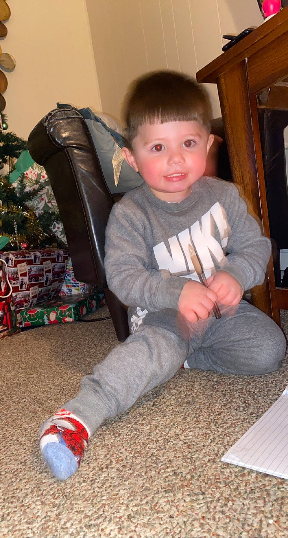 Jayce joined the competition — help win amazing prizes! baby_toddler_clothing, cabinetry, child, christmas, christmas_tree, comfort, event, flooring, fun, happy, holiday, lap, person, room, sitting, sleeve, smile, standing, toddler, tree