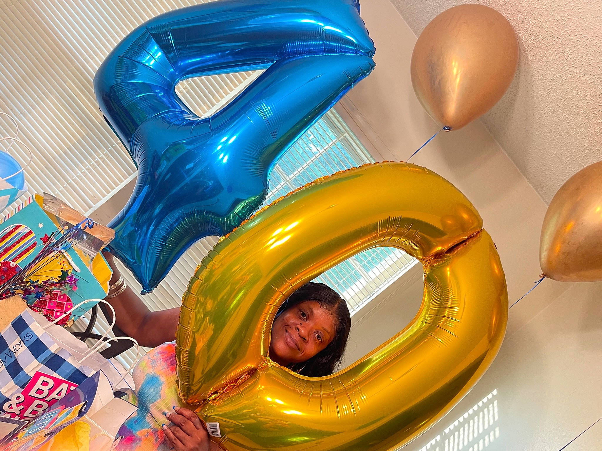 Amora is registered to the contest to win money with this photo: balloon, blue, circle, electric_blue, event, fun, games, happy, human_body, inflatable, joy, leisure, magenta, party_supply, person, personal_protective_equipment, plastic, recreation, room, toddler