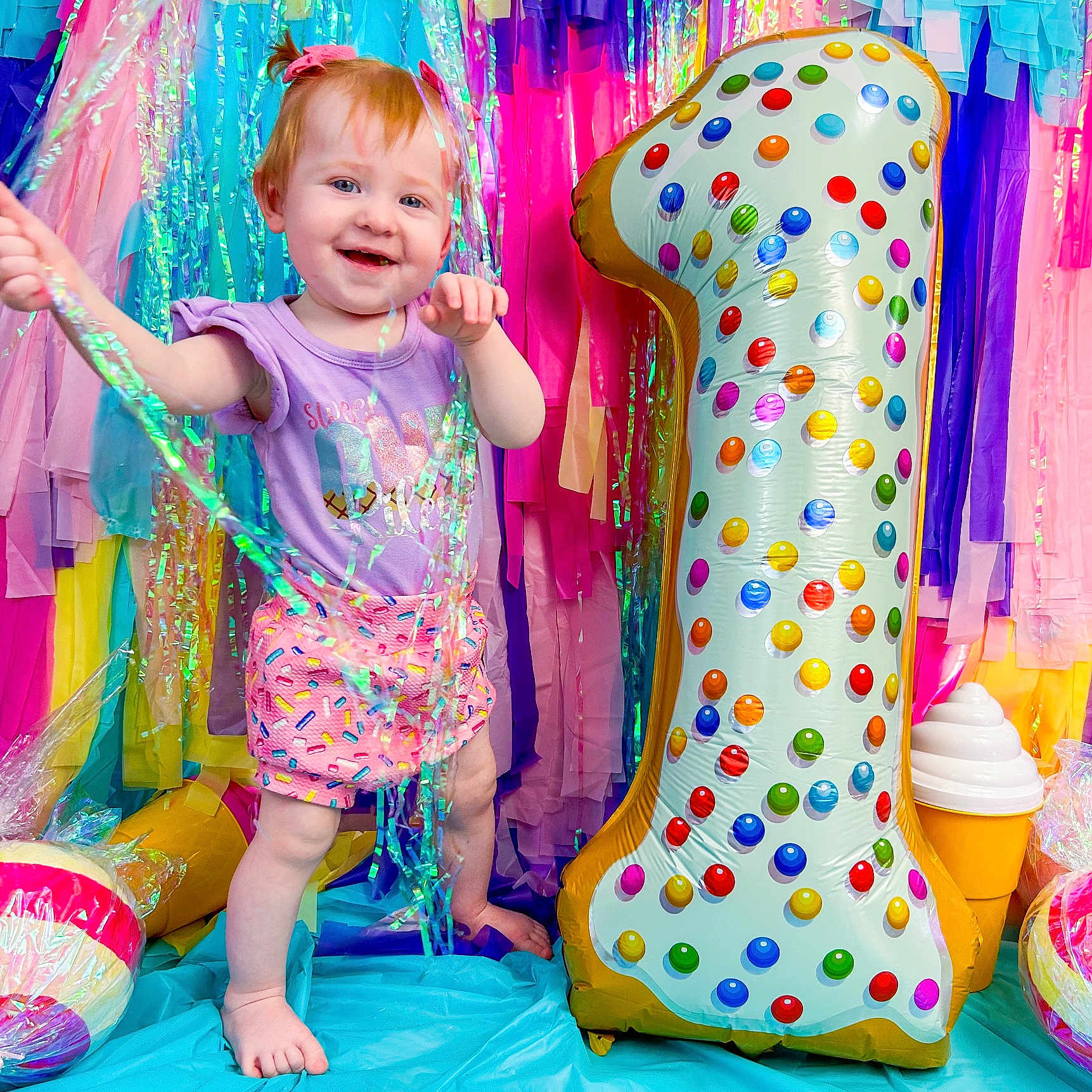 Riley joined the competition — help win amazing prizes! baby, ball, clothing, dress, face, football, head, indoors, number, outdoors, people, person, photography, playarea, portrait, soccer, summer, symbol, t_shirt, text
