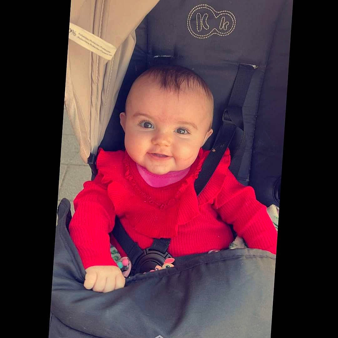 Malya participe au concours pour gagner de l'argent avec cette photo : baby, baby_toddler_clothing, cheek, comfort, eyebrow, flash_photography, fun, happy, iris, jacket, magenta, mouth, nose, person, product, purple, skin, sleeve, smile, tints_and_shades