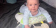 Leo joined the competition — help win amazing prizes! baby, bed, pillow, plush_toy, crib, infant, smile, looking_at_camera, blanket, clothing, indoor, person, cute, child, soft_toy, nursing_pillow, furniture, home, sleeping_area, baby_girl