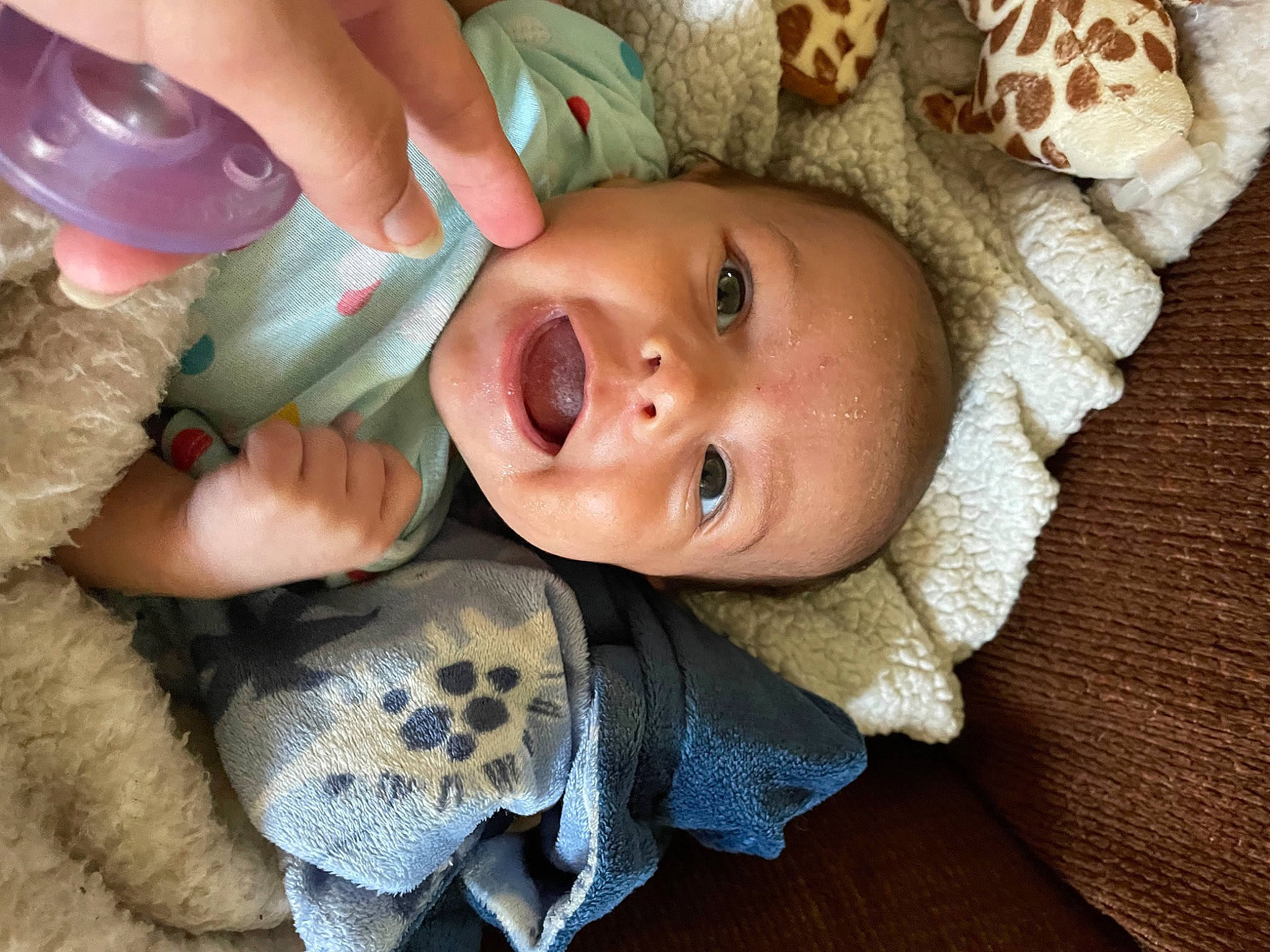 Kahlani is registered to the contest to win money with this photo: baby, baby_toddler_clothing, cheek, ear, eye, eyelash, finger, hand, hat, head, human_body, iris, lip, mammal, mouth, nose, organ, person, skin, textile