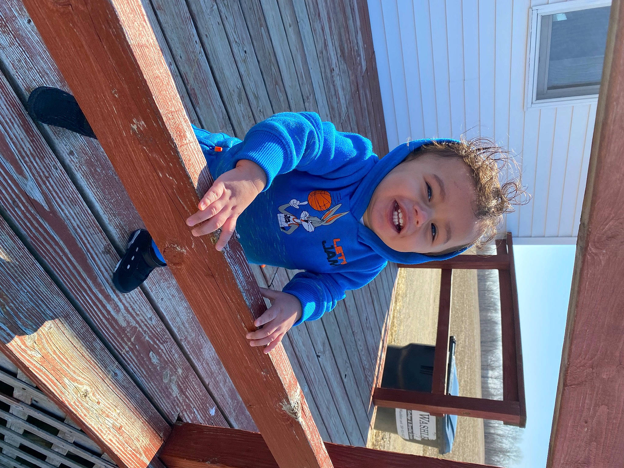 Octavius is registered to the contest to win money with this photo: baby_toddler_clothing, building, child, electric_blue, facade, fun, happy, hat, house, leisure, person, siding, smile, t_shirt, toddler, vacation, window, wood, world