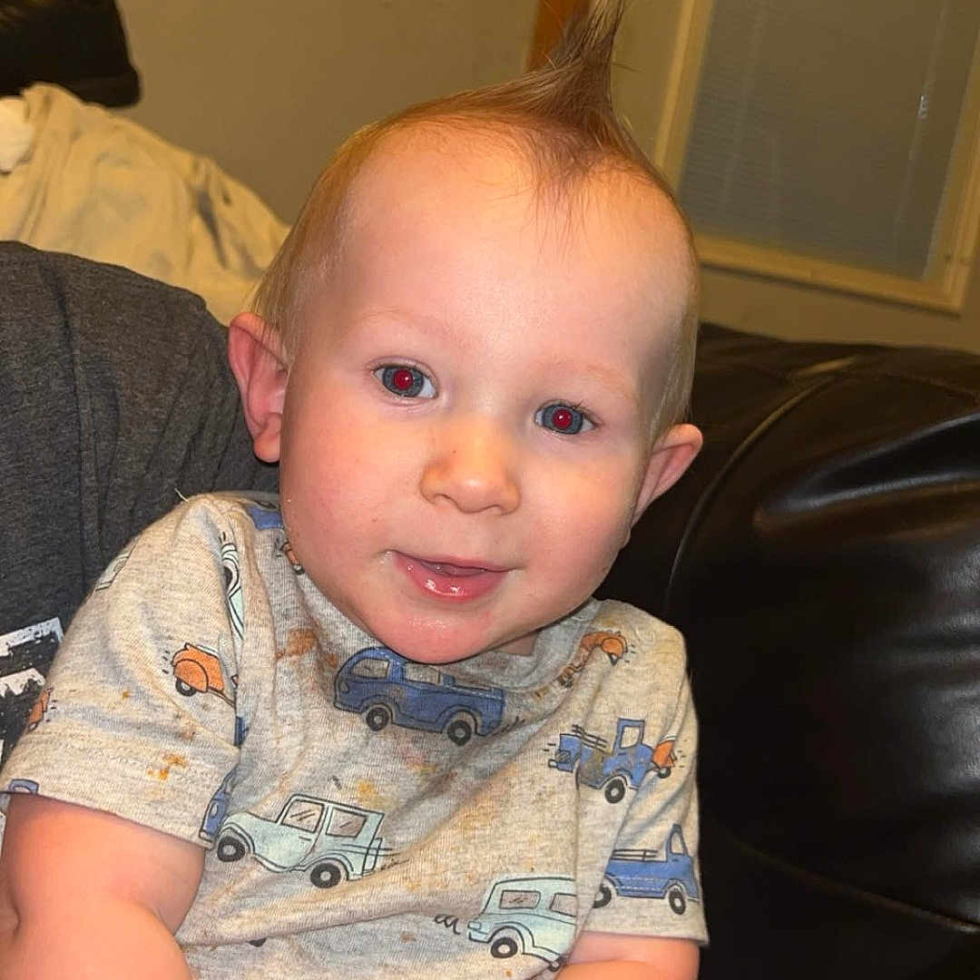 Liam joined the competition — help win amazing prizes! baby, bodypart, clothing, couch, cushion, face, furniture, happy, head, homedecor, indoors, laughing, mouth, pants, person, photography, portrait, sitting, smile, t_shirt