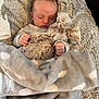 baby, sleeping, blanket, plush_toy, soft, cozy, infant, child, peaceful, cuddle, cute, indoors, resting, toddler, warm, comfort, fur, hands, face, nap