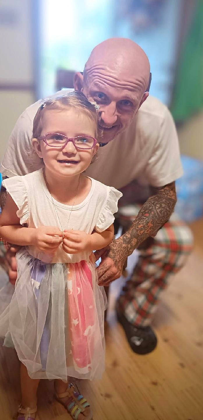 Emmarie is registered to the contest to win money with this photo: baby_toddler_clothing, dress, event, eyewear, formal_wear, fun, gesture, glasses, hairstyle, happy, jewellery, joy, necklace, pattern, person, plaid, skin, smile, tartan, toddler