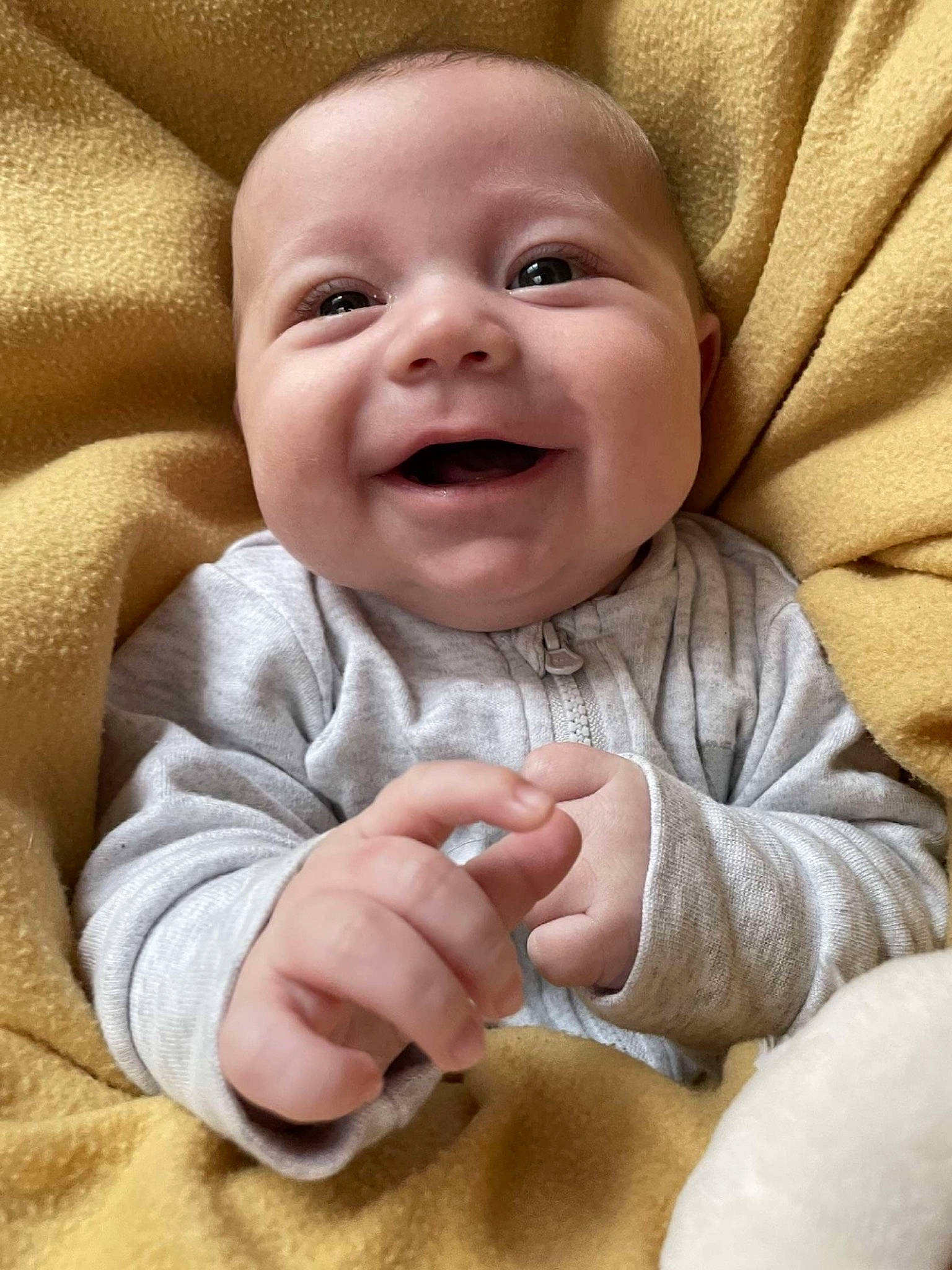 Zahyan participe au concours pour gagner de l'argent avec cette photo : baby, baby_toddler_clothing, cheek, chin, comfort, eye, eyebrow, finger, gesture, happy, iris, lip, mouth, nose, outerwear, person, product, skin, sleeve, smile