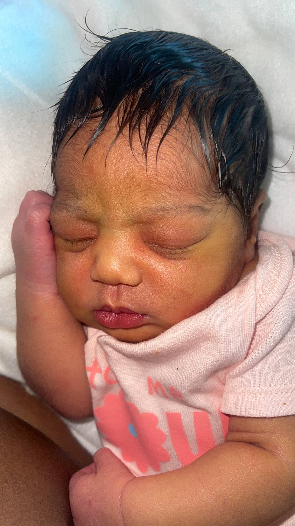 Zahara is registered to the contest to win money with this photo: arm, baby, cheek, chin, comfort, ear, eyebrow, eyelash, finger, forehead, gesture, hand, happy, lip, mouth, neck, nose, person, skin, thumb