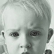 Sasha a rejoint le concours — aidez-le/la à gagner de superbes lots ! toddler, child, face, portrait, black_and_white, expression, curly_hair, eyes, nose, mouth, skin, clothing, blanket, indoor, baby, young_child, closeup, head, person, curious