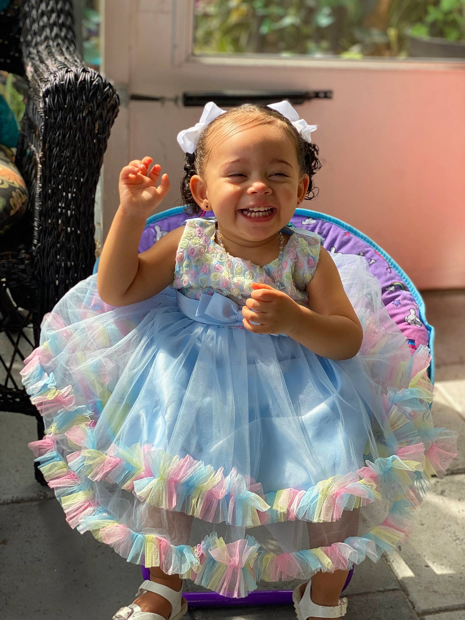 Santana is registered to the contest to win money with this photo: baby_toddler_clothing, child, costume, day_dress, dress, event, face, facial_expression, fun, happy, head, headpiece, iris, joy, magenta, person, pink, purple, sandal, skin