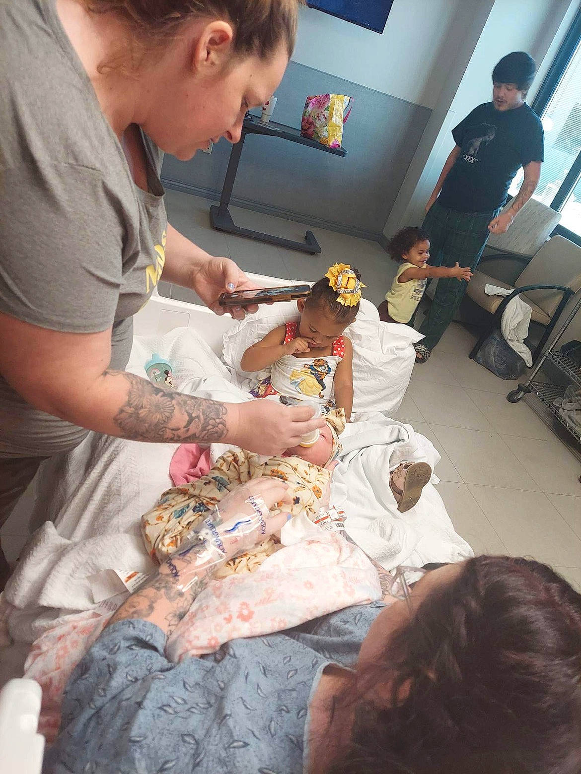 Londyn joined the competition — help win amazing prizes! arm, ceremony, chair, child, event, fashion_design, flesh, fun, headwear, health_care, health_care_provider, job, medical_assistant, medical_procedure, patient, pattern, peach, person, room, service