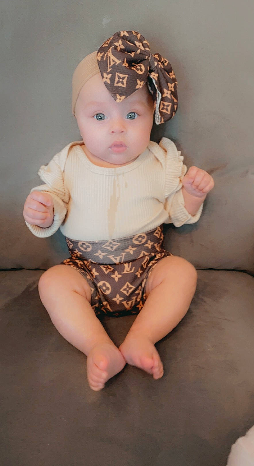 Sofia is registered to the contest to win money with this photo: baby, brown_hair, cheek, child, doll, fawn, head, leg, person, pink, sitting, skin, toddler, toy