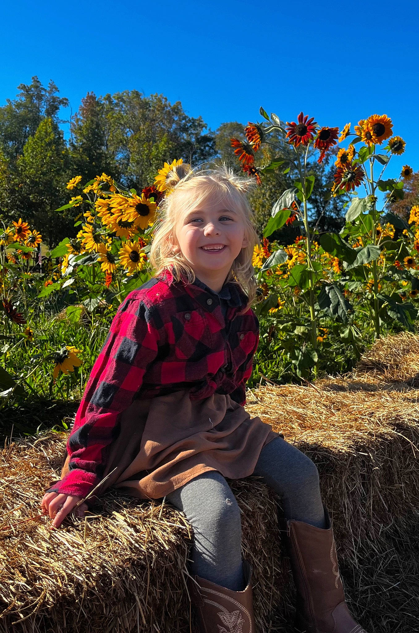 Clara joined the competition — help win amazing prizes! ecoregion, eye, fawn, flower, flowering_plant, grass, grass_family, grassland, happy, joy, landscape, meadow, people_in_nature, person, petal, plant, prairie, sky, smile, summer