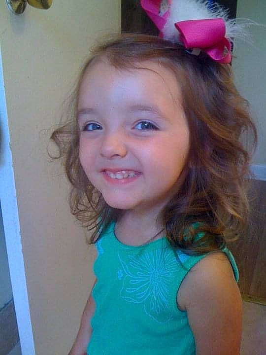 Jane is registered to the contest to win money with this photo: cheek, chin, ear, eye, eyebrow, eyelash, facial_expression, forehead, hair, hairstyle, happy, head, iris, joy, lip, nose, organ, person, purple, skin