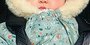 Mélyana participe au concours pour gagner de l'argent avec cette photo : baby, infant, child, coat, jacket, hood, fur, pattern, blue, orange, cute, face, eyes, warm, blanket, seatbelt, car_seat, winter, closeup, portrait