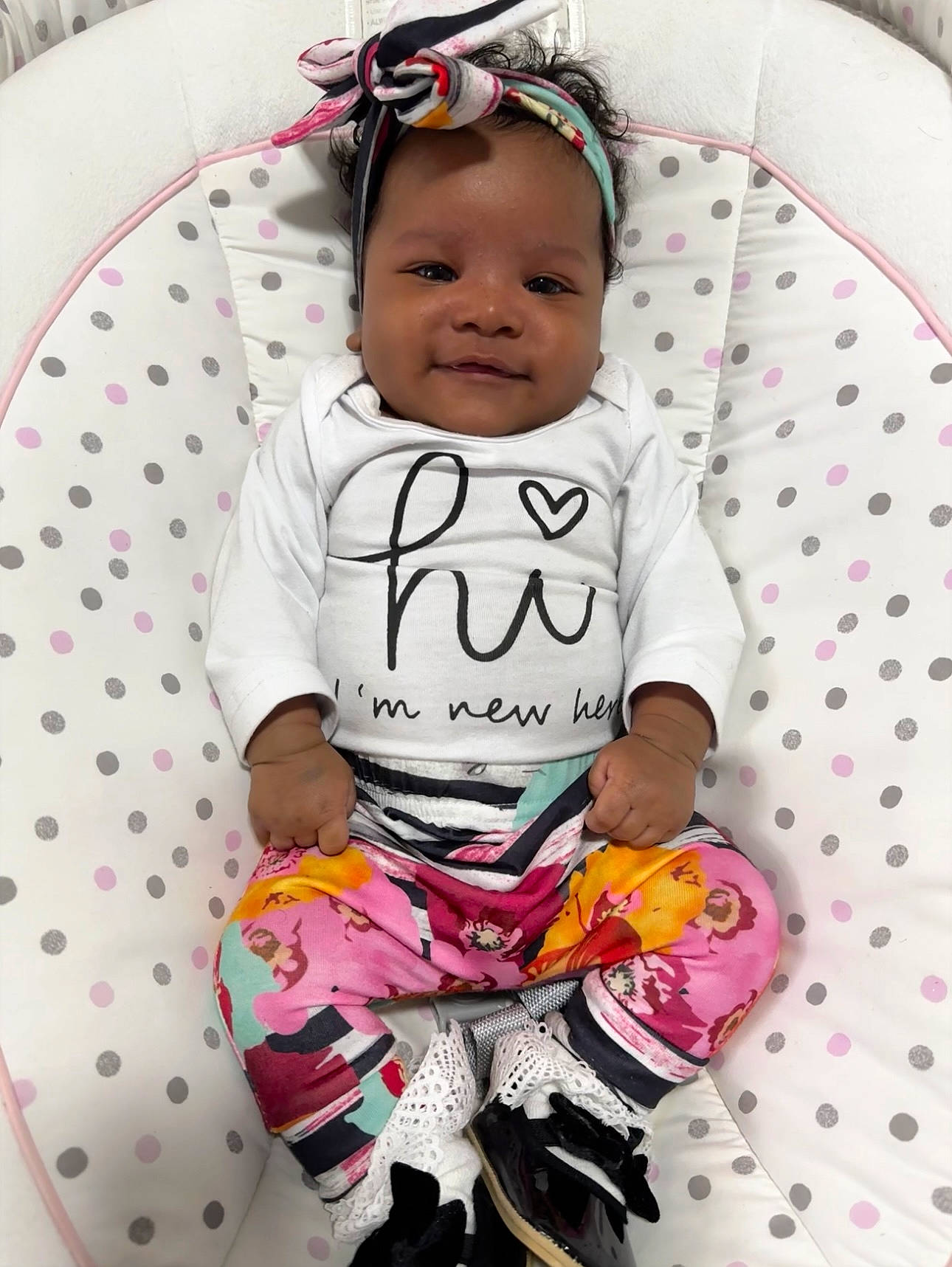 Luna is registered to the contest to win money with this photo: baby, baby_products, baby_toddler_clothing, child, comfort, cool, facial_expression, hairstyle, happy, head, linens, pattern, person, pink, sitting, sleeve, smile, t_shirt, textile, toddler
