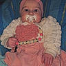 Thalya a rejoint le concours — aidez-le/la à gagner de superbes lots ! baby, beads, blanket, bow, cozy, cushion, cute, dress, eyes, hands, headband, indoor, infant, knit, pacifier, pink, portrait, seated, sweater, toy_clip