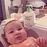 Thalya participe au concours pour gagner de l'argent avec cette photo : baby, baby_bathtub, baby_swing, baby_wash, bath_seat, bath_time, bathroom, blurred_background, chair, chubby_cheeks, cute, hand, infant, portrait, pump_bottle, soap_bottle, table, tub, water, wet_skin