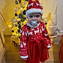 Ambre participe au concours pour gagner de l'argent avec cette photo : toddler, child, christmas_tree, christmas_lights, christmas_ornaments, holiday, festive_clothing, red_dress, santa_hat, pacifier, indoor, flooring, gnome_decoration, white_tree, decorations, holiday_spirit, cute, smiling, festive, home
