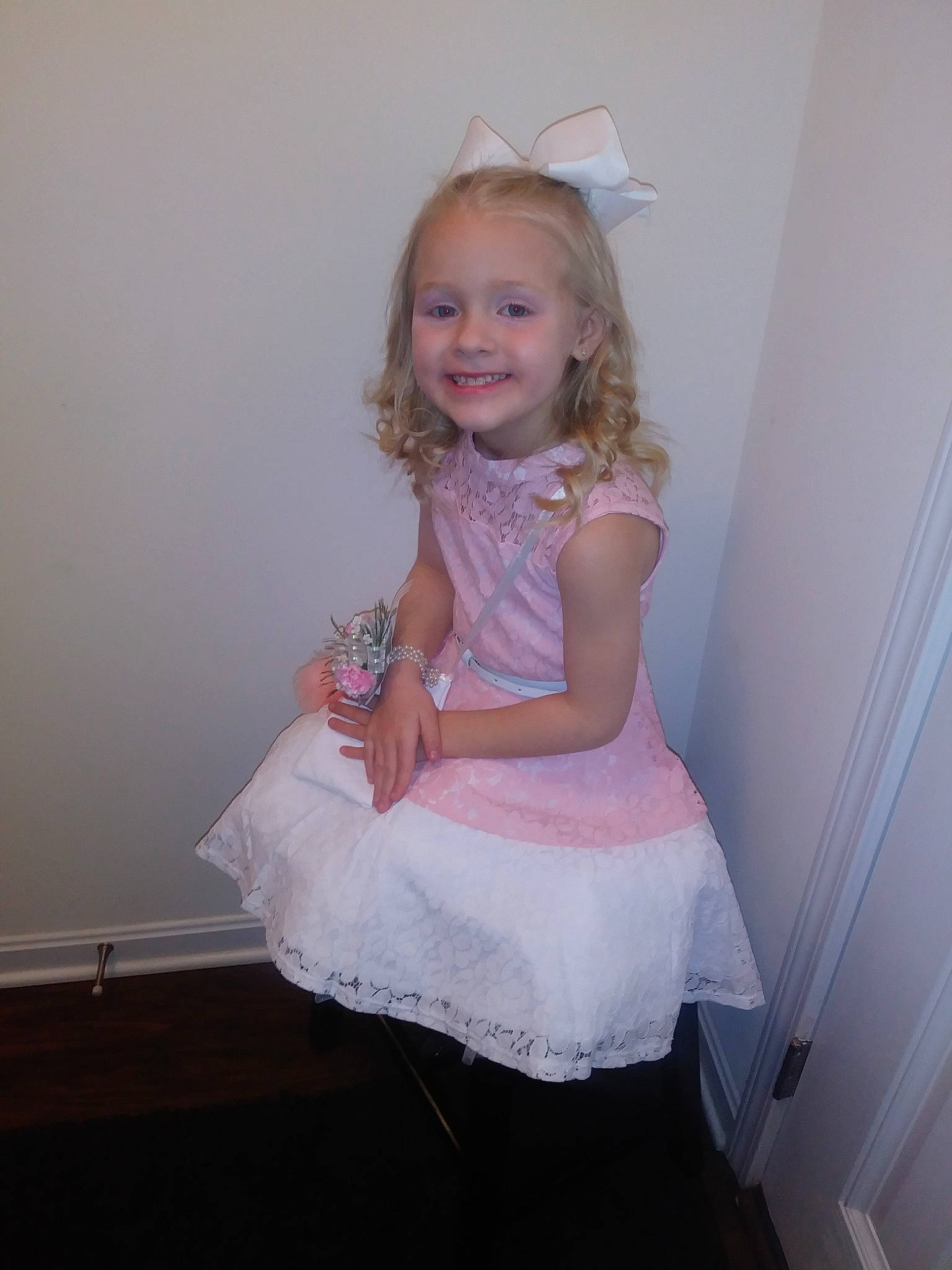 Rylenn is registered to the contest to win money with this photo: baby, blond, child, costume, dress, joy, long_hair, person, pink, sitting, skin, smile, toddler, white