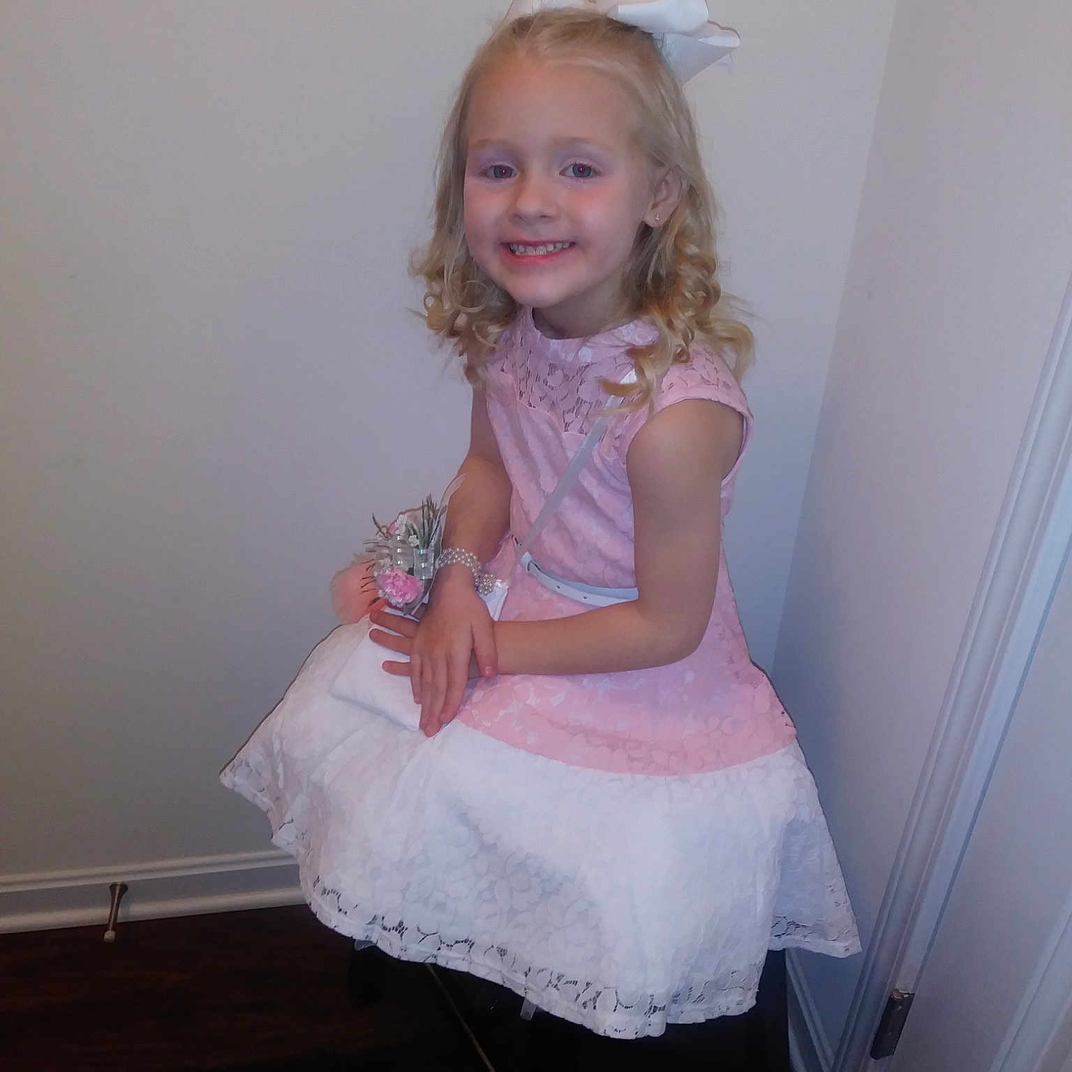 Rylenn is registered to the contest to win money with this photo: baby, blond, child, costume, dress, joy, long_hair, person, pink, sitting, skin, smile, toddler, white