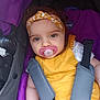Cassandre a rejoint le concours — aidez-le/la à gagner de superbes lots ! baby, child, pacifier, yellow_clothing, headband, stroller, purple, straps, infant, cute, face, eyes, outdoor, person, closeup, seatbelt, young_child, baby_girl, fashion, comfort