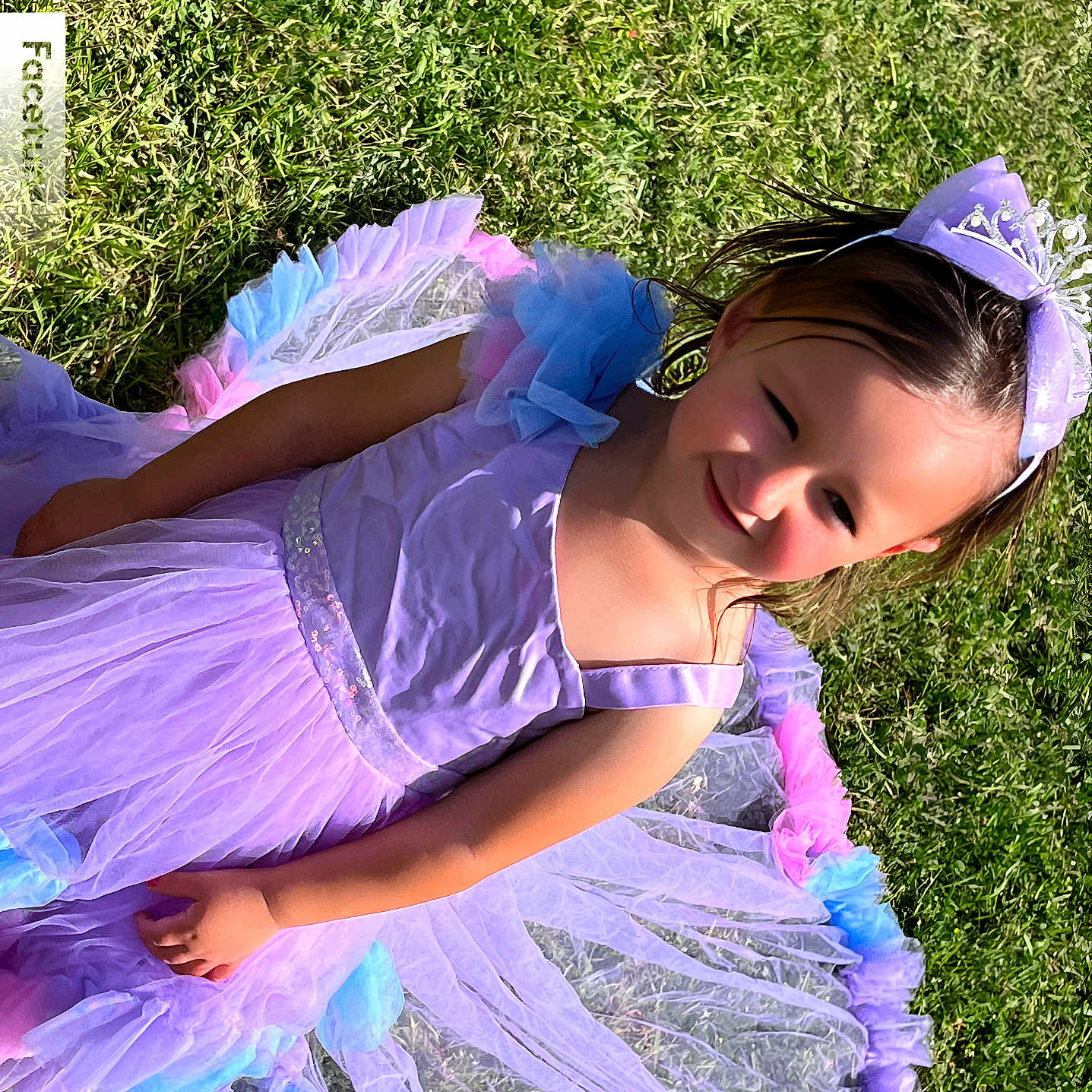 Camilla Deeb is registered to the contest to win money with this photo: accessories, child, clothing, costume, dress, eveningdress, face, female, flower, formalwear, girl, grass, hat, head, lawn, person, photography, plant, portrait, purple